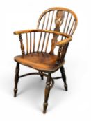 19TH CENTURY YEW & ELM WINDSOR ARMCHAIR with pierced splat and spindle back, shaped solid seat,