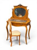 FRENCH INLAID WALNUT DRESSING TABLE having a shaped mirror back, top having inset marble over a