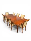 VICTORIAN STYLE MAHOGANY EXTENDING DINING TABLE having a rectangular top with moulded rim, rounded