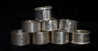 SEVEN SILVER NAPKIN RINGS, 5.5ozt gross, with an EPNS napkin ring Provenance: private collection