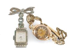 LADIES' VINTAGE 9CT GOLD-CASED SWISS WRISTWATCH, on a gold-plated bracelet; and a Bucherer 800