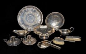 WALKER & HALL SILVER FOUR-PIECE VANITY SET, Sheffield 1938, comprising hand mirror, hair brush,