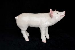LARGE DECORATIVE CERAMIC FIGURE OF A PIGLET, 39 (h) x 57cms (l) Provenance: private collection