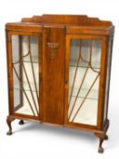ART DECO WALNUT BREAKFRONT DISPLAY CABINET circa 1935-40, opening to plate glass shelves, with