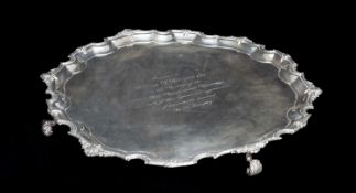 LARGE SILVER PRESENTATION SALVER by Goldsmiths & Silversmiths Company, Birmingham 1948, shaped