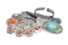 MODERNIST JEWELLERY, including a sterling silver and 'faux opal' bracelet, various brooches, and
