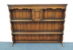 OAK PLATE RACK BACK of two shelves, the upper having a central cupboard, 104 (h) x 137 (w) x