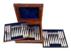 SET OF TWENTY-FOUR VICTORIAN SILVER DESSERT KNIVES & FORKS with wrythen-form mother of pearl