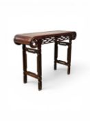 CHINESE ROSEWOOD ALTAR TABLE having scroll ends, pierced apron, pierced supports and stretchers,