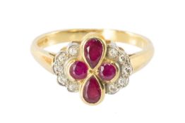 ATTRACTIVE RUBY & DIAMOND CLUSTER RING, in 18ct gold, set with two pear-cut rubies and two round-cut