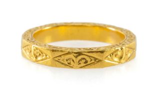 22CT GOLD SCROLL ENGRAVED RING, faceted outer surface, ring size P 1/2, 8.9g Provenance: private