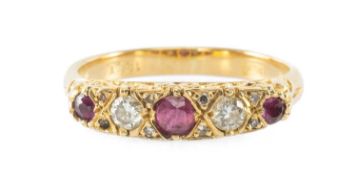 ANTIQUE 18CT GOLD RUBY & DIAMOND FIVE-STONE RING, scroll mount, diamond accent chips, ring size L,