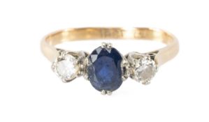 18CT GOLD RING, the central oval sapphire with a small brilliant-cut diamond to either side, size L,