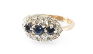 SAPPHIRE & DIAMOND CLUSTER RING, set with three round-cut sapphires, bordered with tiny brilliants