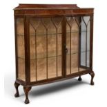 FINE EDWARDIAN MAHOGANY BOWFRONT CHINA CABINET, with twin glazed doors, rail back, on ball and