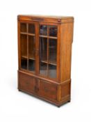 EDWARDIAN OAK BOOKCASE CUPBOARD, with twin glazed doors and base cupboard doors, 144 (h) x 103 (w) x