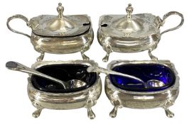 GEORGE V FOUR-PIECE SILVER CONDIMENT SET, comprising two mustard pots with hinged lids and two