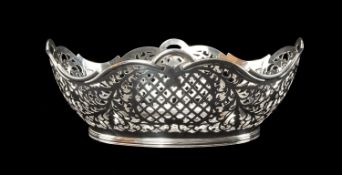 FRENCH SILVER CAKE BASKET, oval section, pierced Rococo sides, 9 (h) x 25.5 (w) x 23.5cms (d), wt.