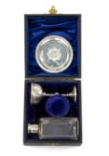 CASED GEORGE V SILVER THREE-PIECE TRAVELLING COMMUNION SET, George Unite, London, goblet with gilt
