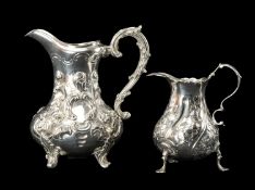 TWO ANTIQUE SILVER BALUSTER CREAM JUGS, larger by Joseph & Joseph Angell, London 1844, embossed