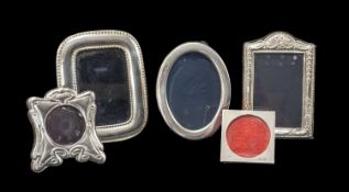 SIX ASSORTED SMALL PHOTOGRAPH FRAMES including two with Art Nouveau embossed designs and circular