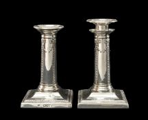 PAIR OF VICTORIAN SILVER COLUMN CANDLESTICKS, London 1896, columns with ribbon-tired harebell