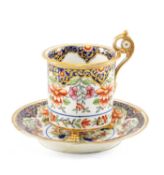 SWANSEA PORCELAIN CABINET CUP & STAND 1815-17, of cylindrical form with everted rim on three lions