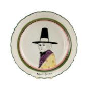 LLANELLY POTTERY 'MARI JONES' TITLED PLATE shaped rim, centre painted with head and shoulders