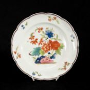 NANTGARW PORCELAIN PLATE, 1820-23, of 12-lobed rim with piecrust moulding, locally decorated by