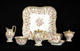 SWANSEA PORCELAIN CABARET SERVICE 1815-17, decorated with spiralling swags of roses between gilt