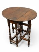 18TH CENTURY OAK GATELEG DINING TABLE, of small proportions, oval top with drop leaves, slender