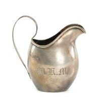SILVER CREAM JUG of helmet form, with loop handle, hallmark rubbed, 10.5cms (h), 2.5ozt