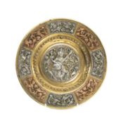INDIAN BRASS, COPPER & SILVER RELIEF WORK PLAQUE, central figure surrounded by panels decorated with