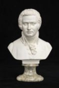 PARIAN BUST OF MOZART, on marbled socle base, 24cms (h) Provenance: private collection Merseyside
