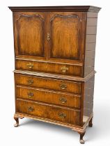 QUEEN ANNE REVIVAL WALNUT PRESS CHEST, having two cupboard doors opening to a single shelf, on a