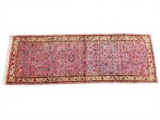 HASSEIN ABAD ABRASHED BLUE GROUND WOOLLEN RUNNER, 310 x 109cmsm Provenance: private collection