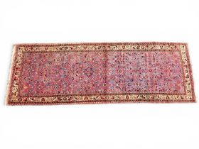 HASSEIN ABAD ABRASHED BLUE GROUND WOOLLEN RUNNER, 310 x 109cmsm Provenance: private collection