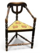 OAK TURNER'S CHAIR, circa 1900, with bobbin-turned frame and triangular seat, 85 (h) x 55 (w) x