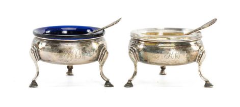PAIR OF GEORGE III CIRCULAR SILVER OPEN SALTS with gilded interiors, each on three hoof feet, London