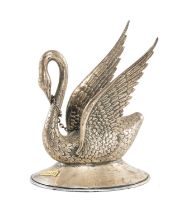 METAL BRANDY WARMER, modelled as a swan with outstretched wings, on oval base, with paper label "