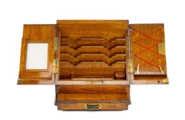 OAK STATIONERY BOX, late 19th / early 20th century, hinged doors enclosing interior fitted with