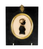 GEORGE III PORTRAIT SILHOUETTE, attributed to Hinton Gibbs (British fl. 1790-1822), reverse