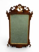 LARGE MAHOGANY FRET FRAMED WALL MIRROR, 19th century, surmount with gilded phoenix Provenance: