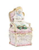 CONTINENTAL PORCELAIN TOBACCO JAR, modelled as a young girl sitting in an upholstered armchair,