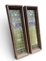 PAIR OF RECTANGULAR LEADED STAINED GLASS PANELS, square and diamond shape panes in various