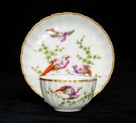 SAMSON, PARIS. CHELSEA STYLE PORCELAIN TEA BOWL & SAUCER, finely painted with exotic birds amongst