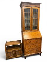 OAK BUREAU BOOKCASE, early 20th century, leaded glazed twin-door upper section with shelf-lined