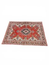BELOUCH RED GROUND WOOLLEN CARPET, 300 x 200cms Provenance: private collection Flintshire
