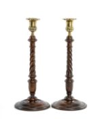 PAIR OF LATE 18TH CENTURY SCOTTISH MAHOGANY CANDLESTICKS, with circular bases, spiralled turned