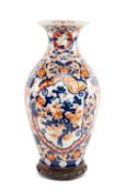 JAPANESE IMARI VASE, late 19th century, traditional decoration, on a pierced hardwood base, 45cms (
